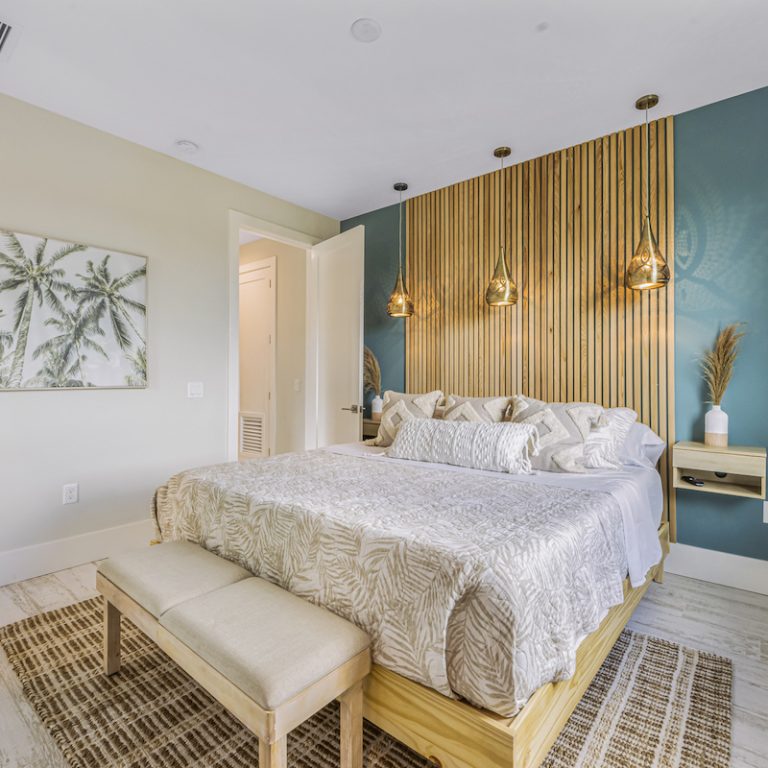 Beautiful bedroom with updated finishings and a comfortable bed
